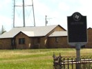 View of historical marker and house